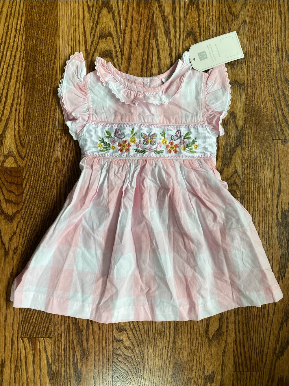New with tag, Lil Cactus butterfly/floral smocked dress, size 12-18 months